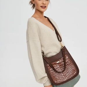 Leather bag in black color made in Poland .